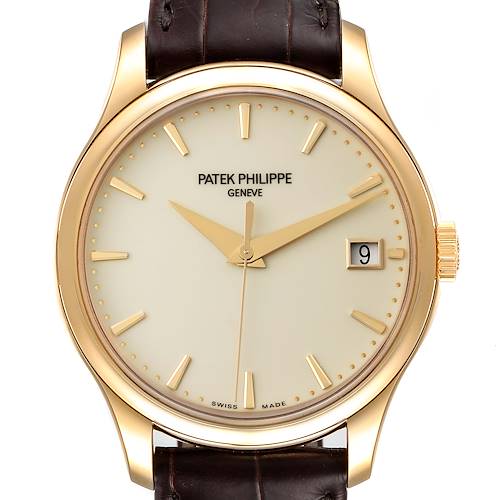 This image shows a Patek Philippe Calatrava watch, front view, showcasing its dial, hands, date window, case, and leather strap.