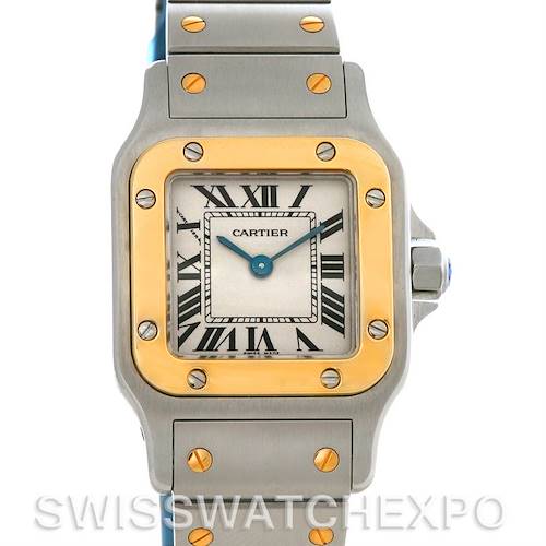 The image shows a front view of the Cartier Santos watch, highlighting its square dial, two-tone bezel, and metal bracelet with screws.