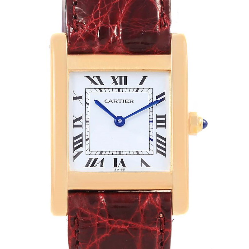 This image shows a front view of the face and a portion of the strap of a Cartier Tank Classic watch.