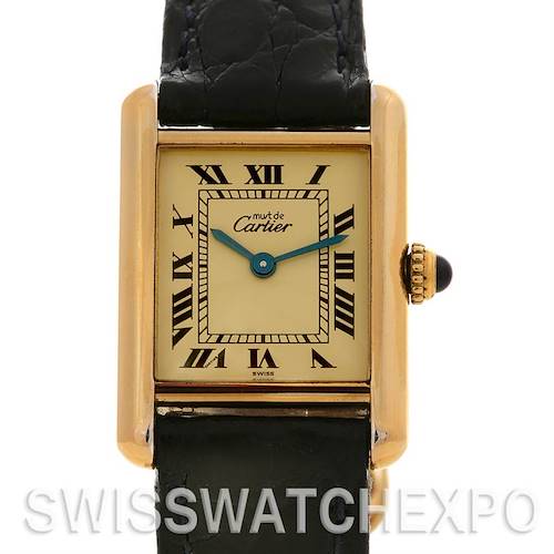 The image shows a Tank Classic by Cartier from the front, highlighting its face, rectangular case, and part of its strap.