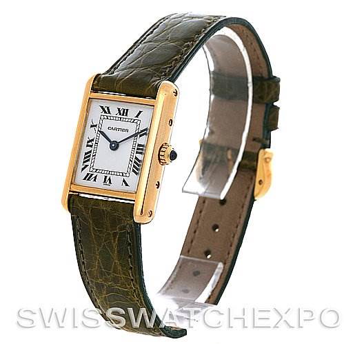 The image shows a Cartier Tank Classic watch with a gold rectangular case, white dial with Roman numerals, and a green leather strap.