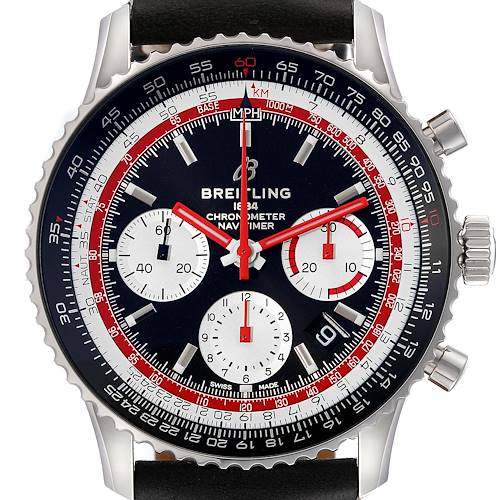 The image shows a Breitling Navitimer watch face at a close-up angle, highlighting the chronograph subdials and tachymeter bezel.