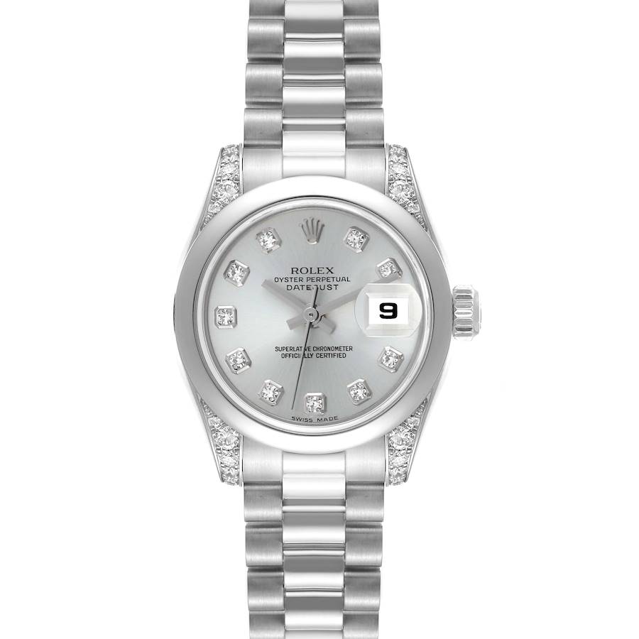 The image shows a front view of the Rolex President model watch, featuring the dial, bracelet, crown, and date display.