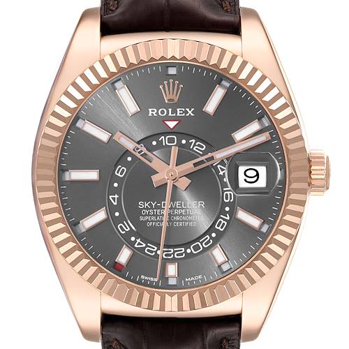 The image shows a front view of the Rolex Sky-Dweller watch, highlighting its face, bezel, and crown.