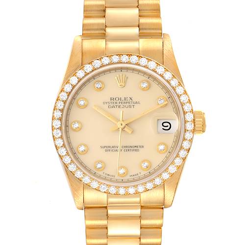 The watch is a Rolex President model, shown from the front, featuring a gold bracelet and diamond-encrusted bezel.