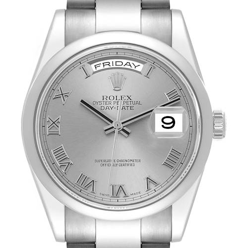 This is a front view of the Rolex President model watch, showing the dial, day and date windows, and part of the bracelet.
