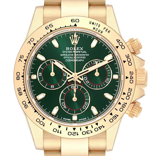 The Rolex Daytona watch is shown from a front angle, highlighting the gold case, green dial, three subdials, and bezel.