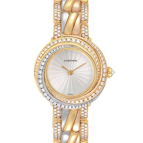 The image shows the face and part of the bracelet of a Trinity model watch by Cartier, featuring diamond accents.