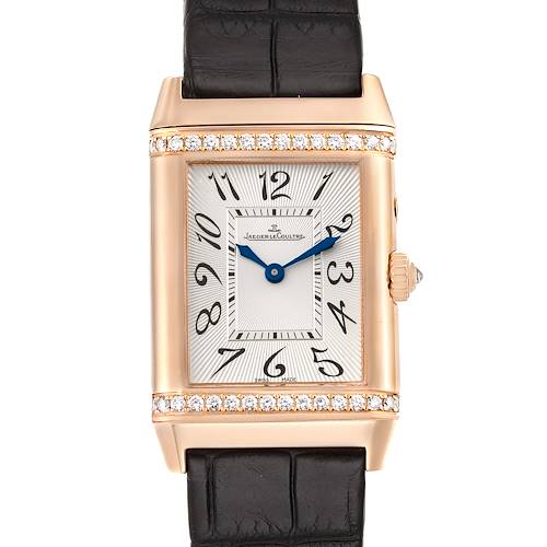 This image shows a front view of the Jaeger LeCoultre Reverso watch with a rose gold case, diamond bezel, and black leather strap.