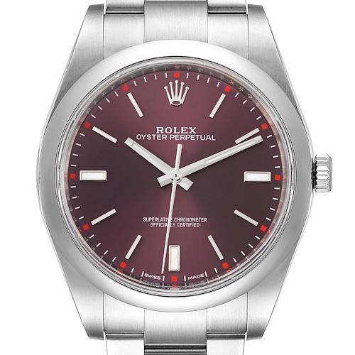 This image shows the Rolex Oyster Perpetual model from a front angle, highlighting its dial, hands, and part of its metal bracelet.