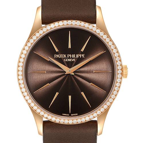 The image shows a front view of the Patek Philippe Calatrava watch featuring a brown dial and diamond-studded bezel.