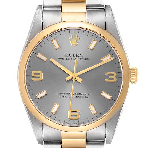 The image shows a front view of the Rolex Oyster Perpetual watch, highlighting its dial, hands, crown, and part of the bracelet.